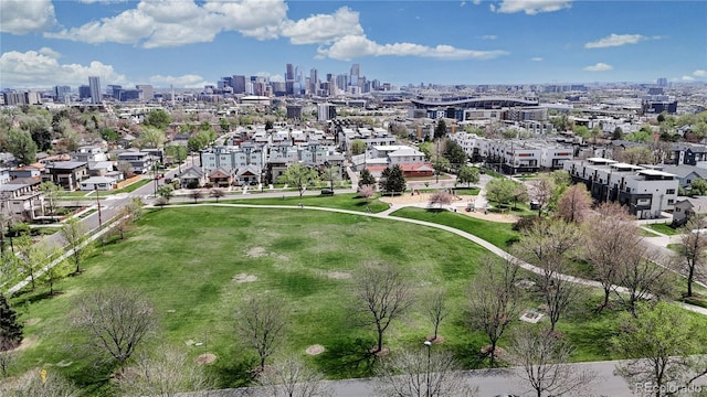 birds eye view of property with a city view