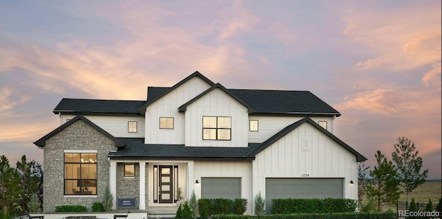 modern farmhouse featuring a garage