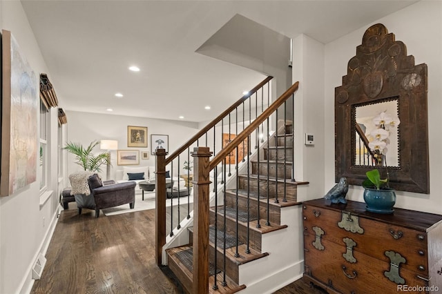 6128 S Coventry Ln E, Littleton, CO 80123 - stairs with wood finished floors, recessed lighting, and baseboards