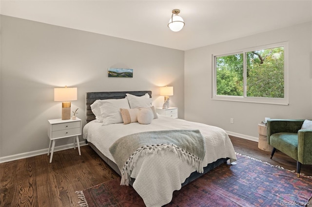 6128 S Coventry Ln E, Littleton, CO 80123 - bedroom with baseboards and wood finished floors