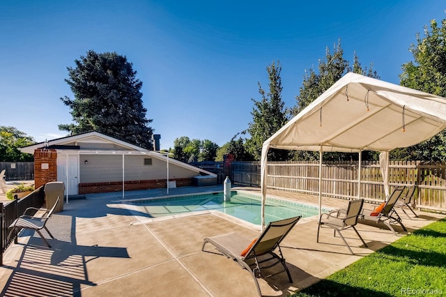 6128 S Coventry Ln E, Littleton, CO 80123 - view of swimming pool with a patio area