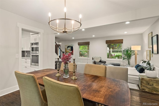 6128 S Coventry Ln E, Littleton, CO 80123 - dining area featuring a chandelier, recessed lighting, dark wood-type flooring, stairway, and baseboards