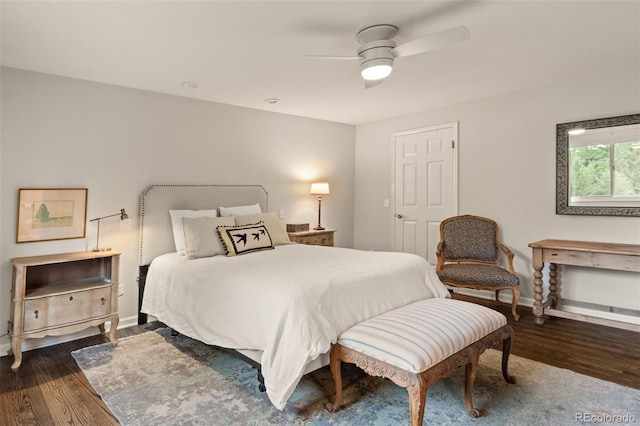 6128 S Coventry Ln E, Littleton, CO 80123 - bedroom with dark wood-style floors, baseboards, and a ceiling fan