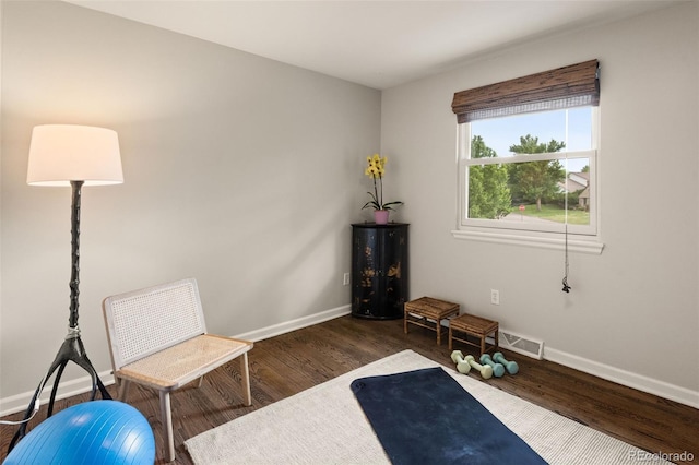 6128 S Coventry Ln E, Littleton, CO 80123 - sitting room featuring wood finished floors and baseboards