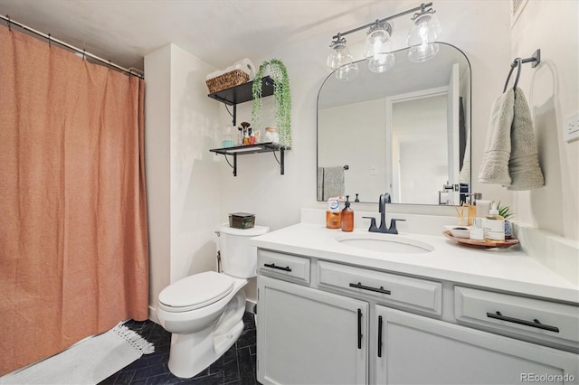 bathroom with vanity, toilet, and curtained shower