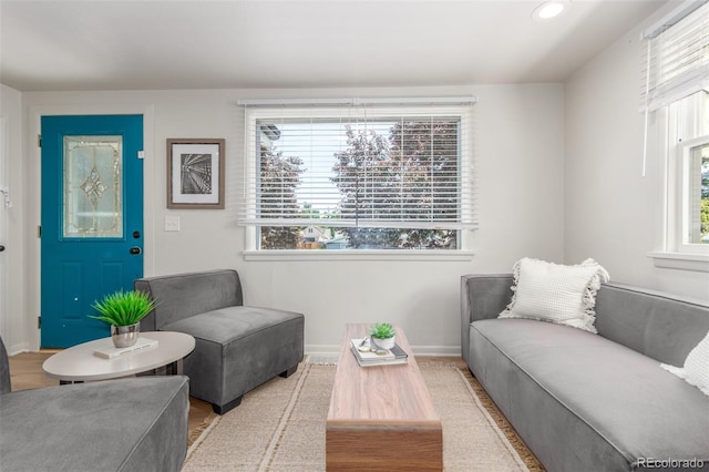 2845 Eaton St, Wheat Ridge, CO 80214 - living room with healthy amount of natural light, wood finished floors, and recessed lighting