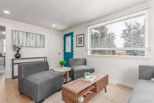 2845 Eaton St, Wheat Ridge, CO 80214 - living room with light wood-style flooring and recessed lighting