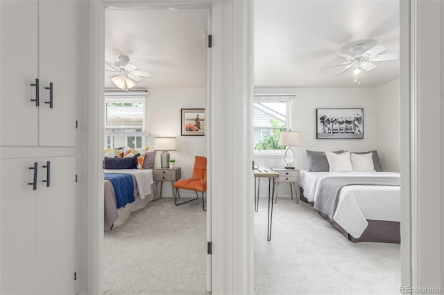 2845 Eaton St, Wheat Ridge, CO 80214 - carpeted bedroom with multiple windows and a ceiling fan