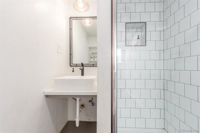 2845 Eaton St, Wheat Ridge, CO 80214 - full bath featuring a tile shower and a sink