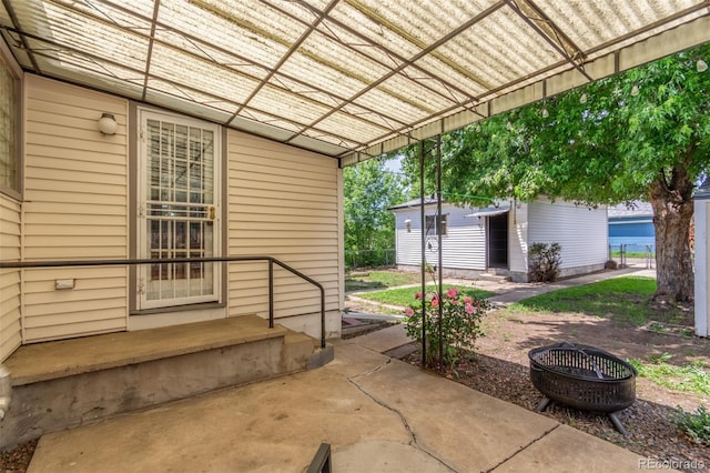 2845 Eaton St, Wheat Ridge, CO 80214 - view of patio featuring an outbuilding