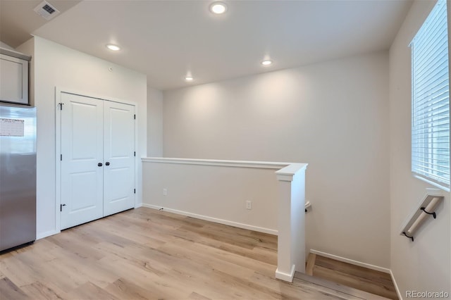 interior space with light hardwood / wood-style flooring