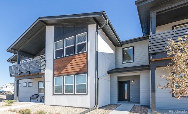 2296 Setting Sun Dr Unit 3, Windsor, CO 80550 - view of front of property featuring a balcony