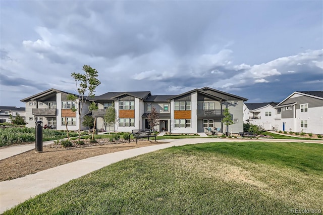 2296 Setting Sun Dr Unit 3, Windsor, CO 80550 - view of front facade featuring a residential view and a front yard