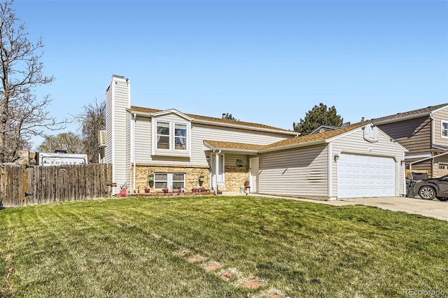 12425 Bellaire Dr, Thornton, CO 80241 - view of front of property featuring a chimney, an attached garage, driveway, and brick siding