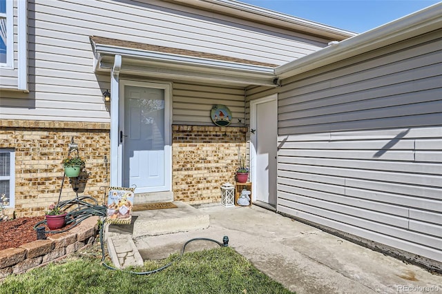 12425 Bellaire Dr, Thornton, CO 80241 - view of exterior entry with brick siding