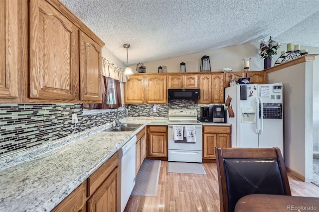 12425 Bellaire Dr, Thornton, CO 80241 - kitchen with white appliances, a sink, vaulted ceiling, a textured ceiling, and backsplash