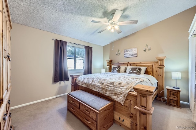 12425 Bellaire Dr, Thornton, CO 80241 - bedroom with light colored carpet, a textured ceiling, baseboards, vaulted ceiling, and ceiling fan