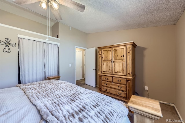 12425 Bellaire Dr, Thornton, CO 80241 - bedroom featuring carpet, lofted ceiling, a textured ceiling, and a ceiling fan