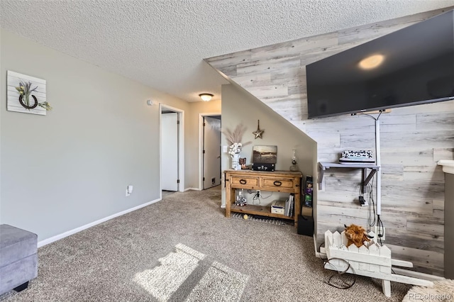 12425 Bellaire Dr, Thornton, CO 80241 - carpeted living room featuring a textured ceiling and baseboards