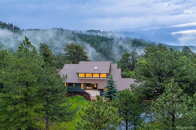 1952 Columbine Ct, Golden, CO 80401 - view of subject property with a heavily wooded area
