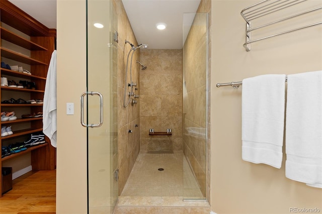 1952 Columbine Ct, Golden, CO 80401 - full bathroom featuring a stall shower, recessed lighting, and wood finished floors