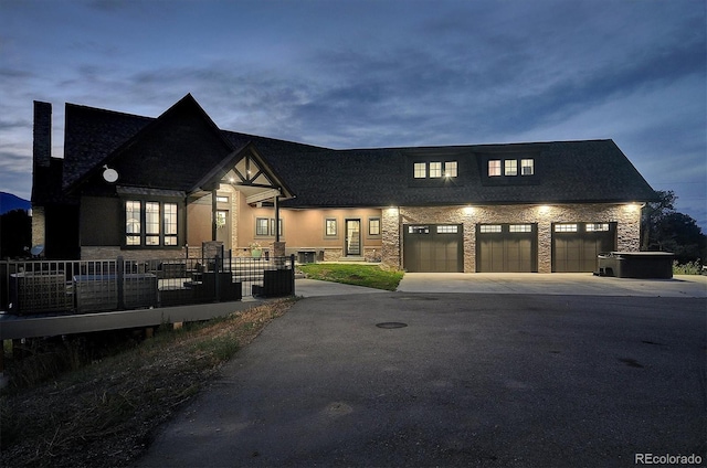 view of front of home with a garage