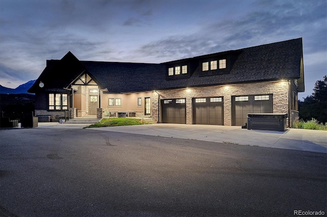 view of front of property with a garage