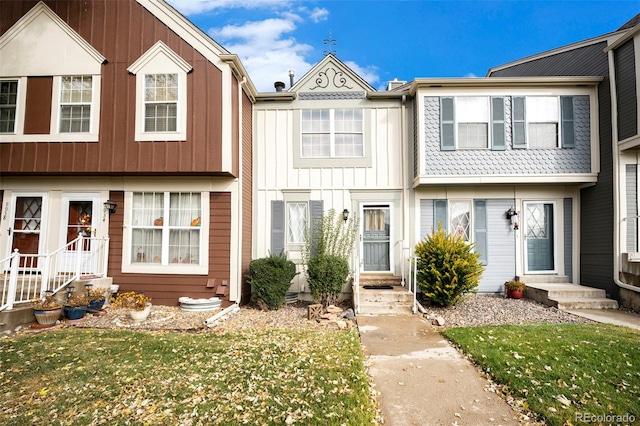 view of property with a front lawn