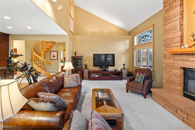 living room featuring high vaulted ceiling, carpet, a fireplace, and stairway