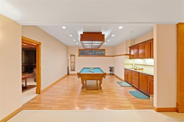 game room with baseboards, light wood-style flooring, and recessed lighting