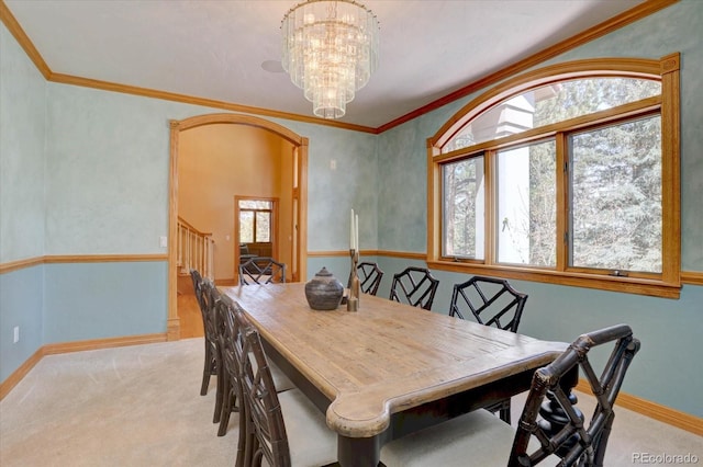 2828 Keystone Dr, Evergreen, CO 80439 - dining area featuring plenty of natural light, carpet floors, and ornamental molding