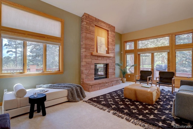 2828 Keystone Dr, Evergreen, CO 80439 - carpeted living area featuring healthy amount of natural light and a fireplace