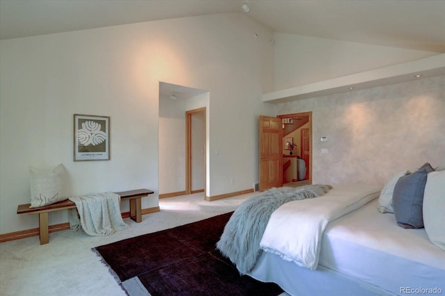 2828 Keystone Dr, Evergreen, CO 80439 - bedroom with carpet floors, high vaulted ceiling, and baseboards
