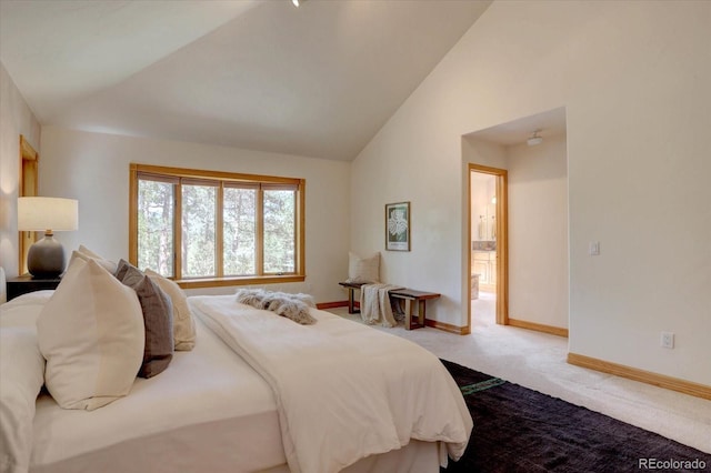 2828 Keystone Dr, Evergreen, CO 80439 - bedroom featuring vaulted ceiling, carpet, and baseboards