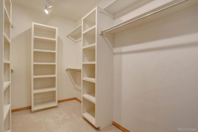 2828 Keystone Dr, Evergreen, CO 80439 - walk in closet with carpet flooring