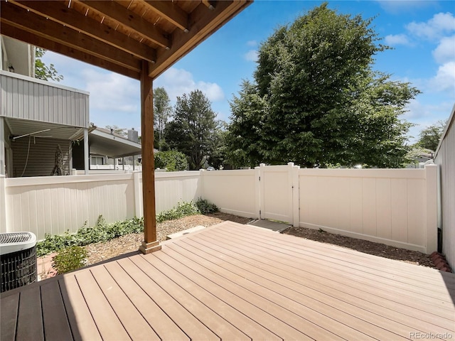 1925 28th Ave Unit 34, Greeley, CO 80634 - wooden terrace featuring a fenced backyard