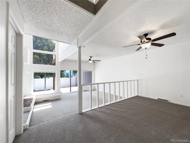 1925 28th Ave Unit 34, Greeley, CO 80634 - carpeted empty room with ceiling fan and a textured ceiling
