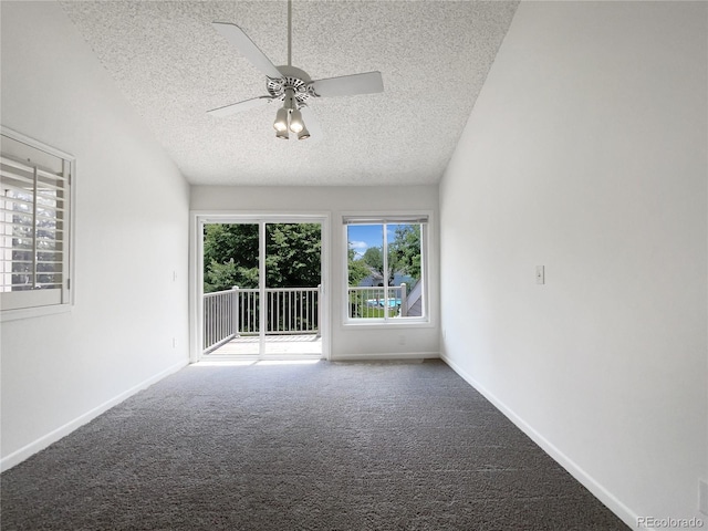 1925 28th Ave Unit 34, Greeley, CO 80634 - carpeted empty room with a textured ceiling and a ceiling fan