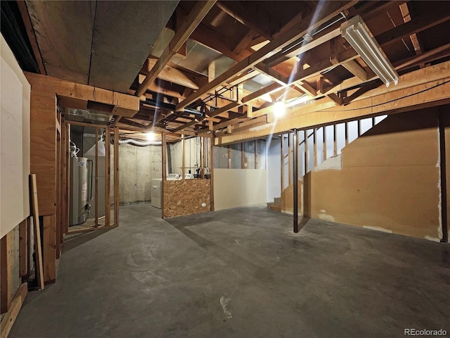 1925 28th Ave Unit 34, Greeley, CO 80634 - unfinished basement with gas water heater and stairway
