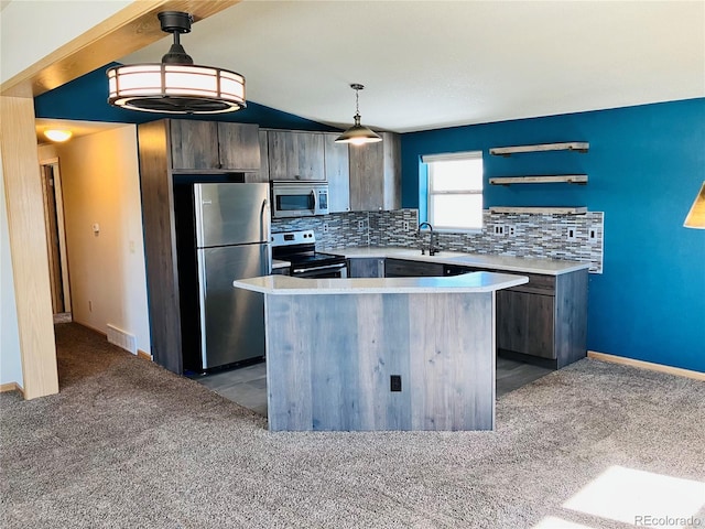 kitchen with tasteful backsplash, visible vents, light countertops, carpet flooring, and stainless steel appliances