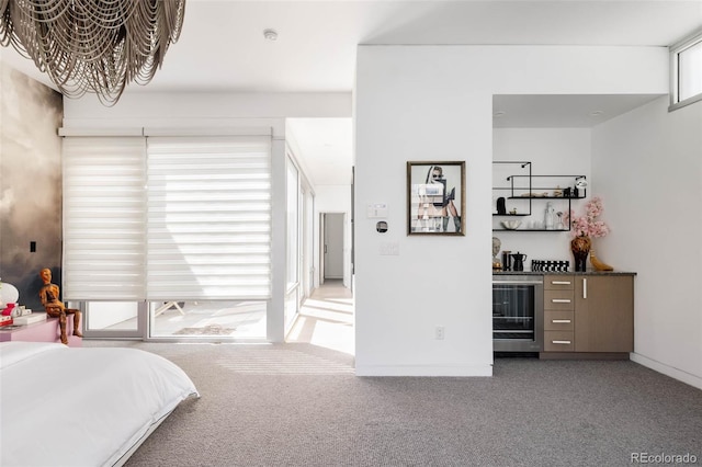 carpeted bedroom with wine cooler