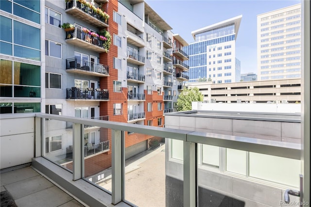 balcony featuring a city view