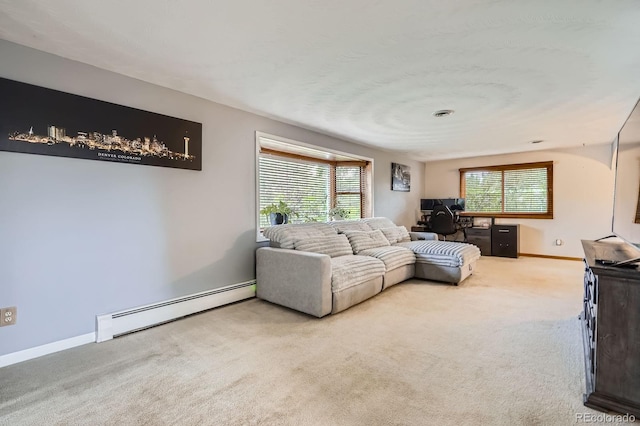 11290 W 77th Dr, Arvada, CO 80005 - carpeted living area with baseboard heating and a desk