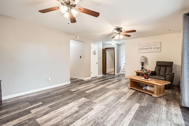 11290 W 77th Dr, Arvada, CO 80005 - sitting room featuring ceiling fan, stairway, and wood finished floors