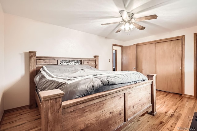 11290 W 77th Dr, Arvada, CO 80005 - bedroom featuring light wood-style flooring, a ceiling fan, and a closet
