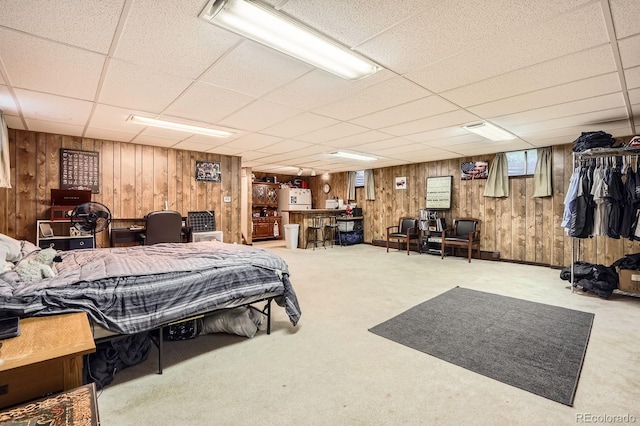 11290 W 77th Dr, Arvada, CO 80005 - bedroom with wood walls, a paneled ceiling, and carpet flooring