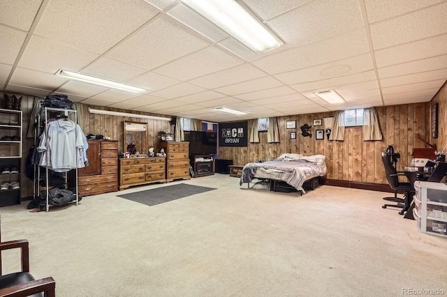 11290 W 77th Dr, Arvada, CO 80005 - carpeted bedroom with wooden walls and a drop ceiling