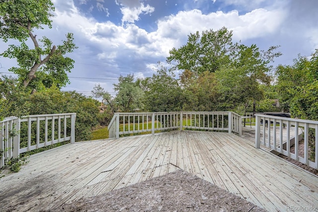 11290 W 77th Dr, Arvada, CO 80005 - wooden terrace featuring view of scattered trees