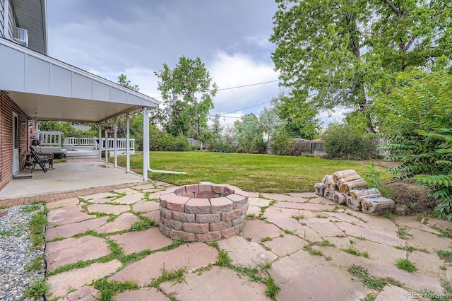 11290 W 77th Dr, Arvada, CO 80005 - view of patio / terrace with a fire pit