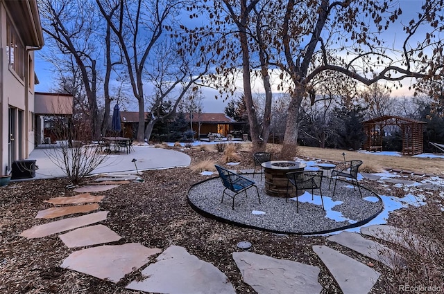 view of yard with an outdoor fire pit, a patio, and a gazebo